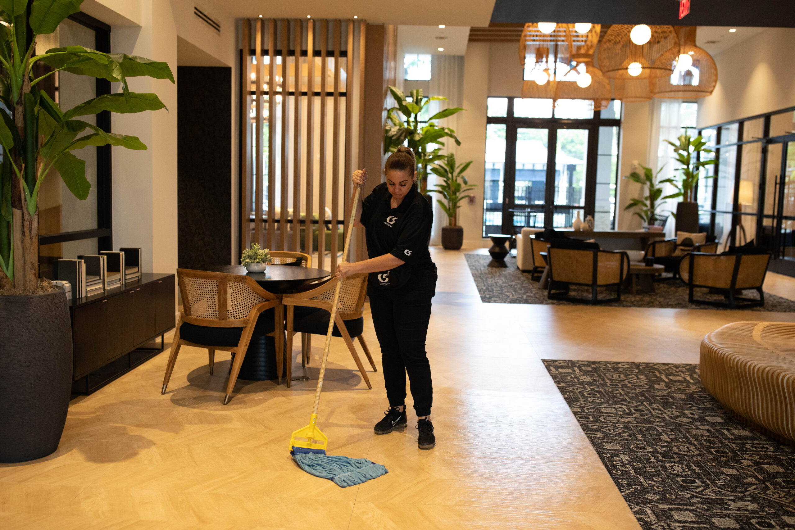 Clean Space cleaner mopping a commercial floor in Florida