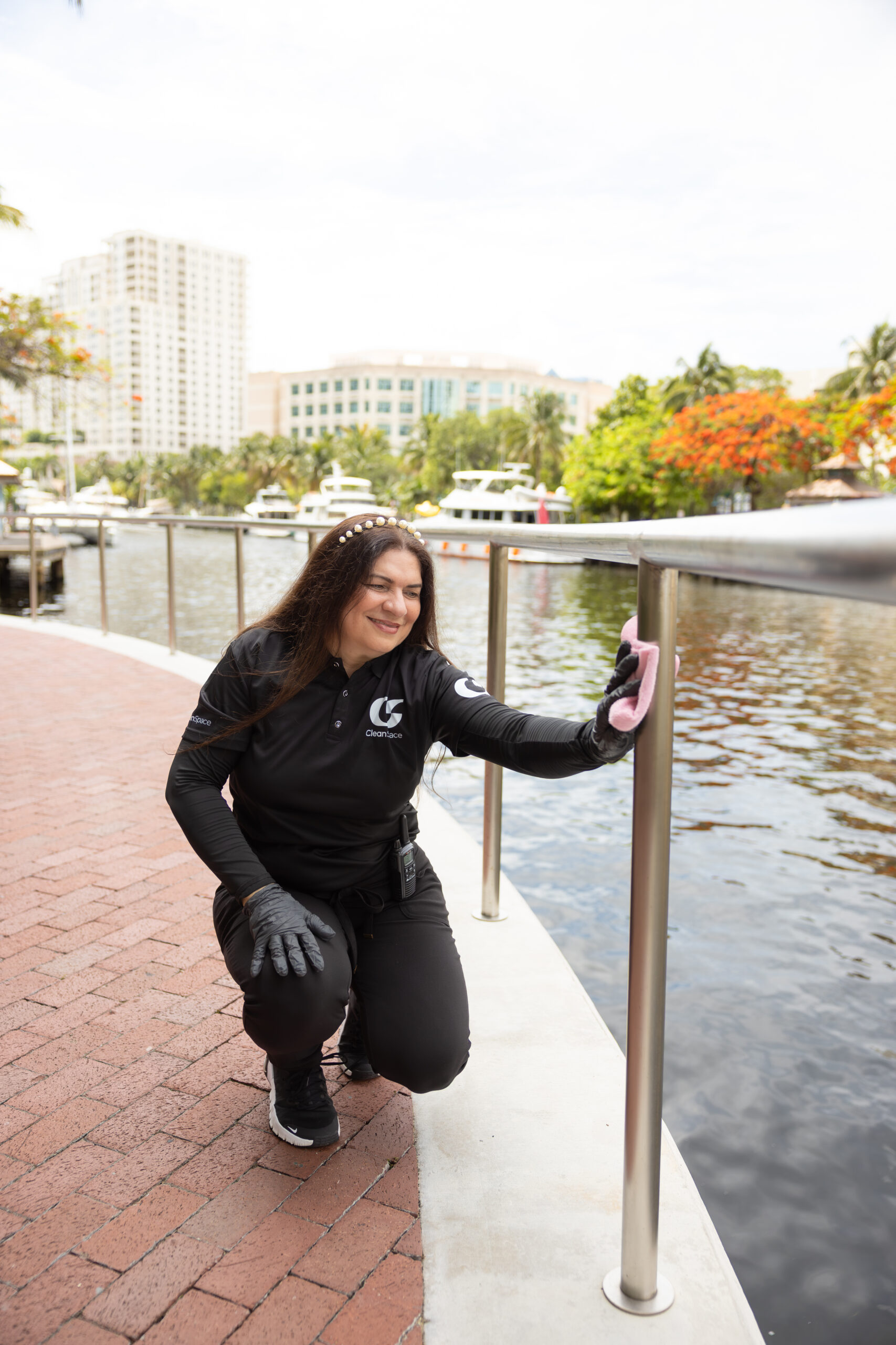Clean Space cleaner sanitizing a riverwalk handrail in Florida